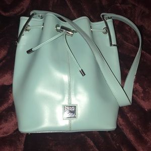 Dooney & Bourke. Sold locally!